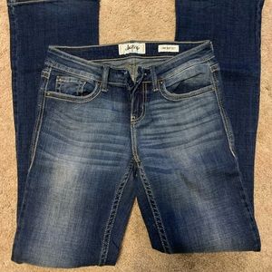 Women’s buckle jeans